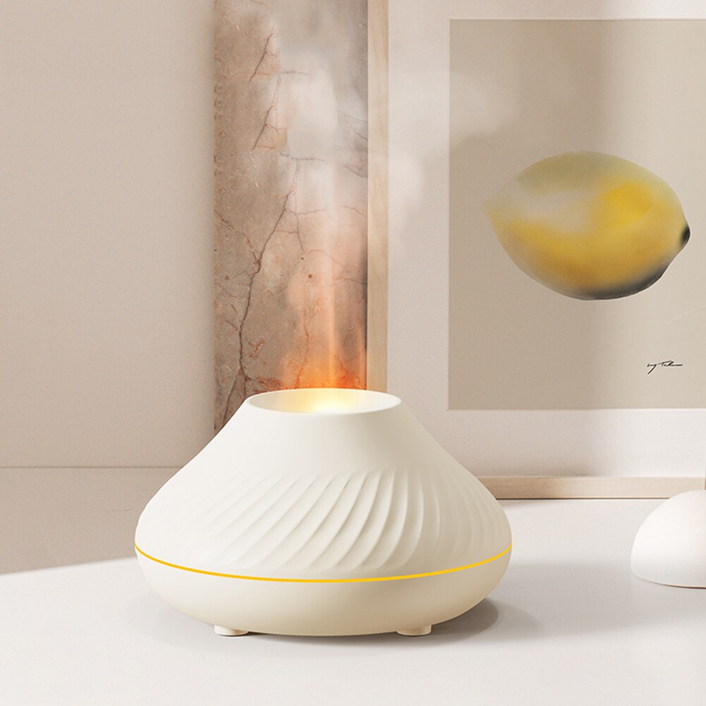 Stilren vulkanisk diffuser for aromaterapi. Sprer velduftende oljer og skaper en avslappende LED-lysatmosfære.