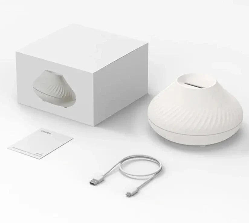 LED-luftfukter og diffuser i vulkanisk stil. Perfekt for avslapning, bedre inneklima og stemningsfullt lys.