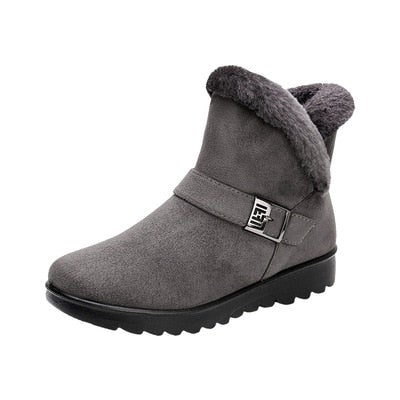 Damen-Winterstiefel in Braun mit Pelzfutter, seitlich, perfekt für kalte Tage.